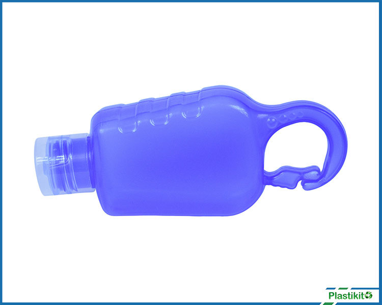 Envase rectangular de colores para gel antibacterial de 60 ml con clip para colgar.